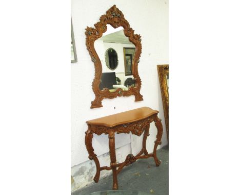 CONSOLE TABLE, carved wood with cabriole supports 120cm x 90cm H x 52cm and a mirror to match, 98cm x 146cm H. (2)