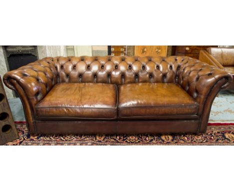 CHESTERFIELD SOFA, vintage hand finished, leaf brown leather, deep buttoned upholstered, curved back and arms, with two seat 