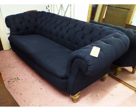 CHESTERFIELD SOFA, Victorian, giltwood, in buttoned black fabric, 212cm W.