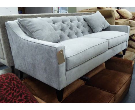 SOFA, two seater, in buttoned grey fabric on square ebonised supports, 191cm L.