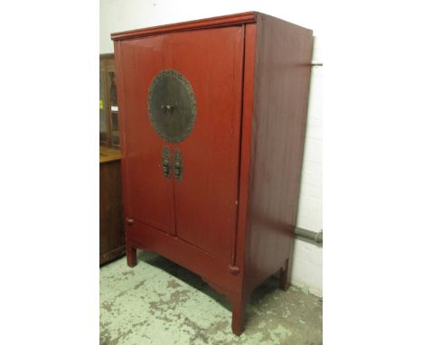 MARRIAGE CABINET, Chinese red lacquer, with two doors enclosing a shelf and drawer, 110cm x 62cm x 171cm H. (with faults)