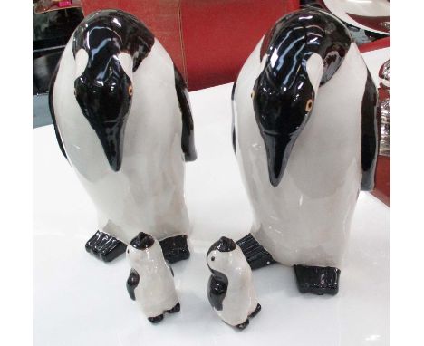 PENGUINS, a family of four in ceramic, largest 39cm H. (4)