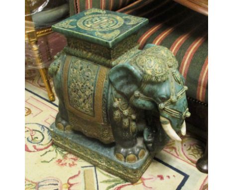 PLANT STAND, in the form of a glazed ceramic elephant, 20cm x 50cm x 57cm H. (with faults)