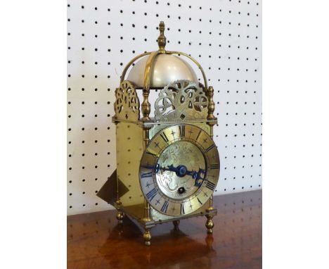 LANTERN CLOCK, circa 1900 of traditional form with ornate brass case, Swiss made bell striking movement 26cm H overall. [vend