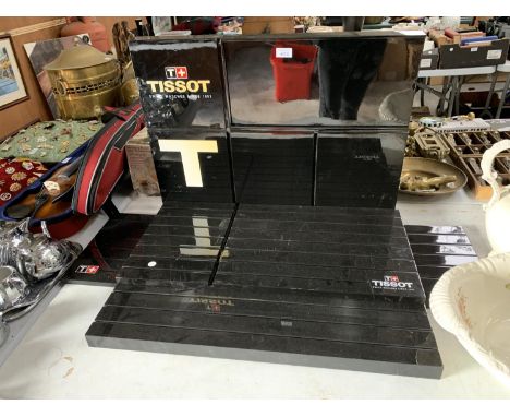 A LARGE TISSOT WATCH DISPLAY STAND 