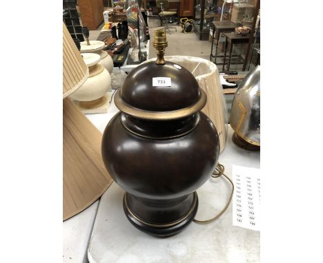 A LARGE LAMP BASE TOGETHER WITH CREAM SHADE 