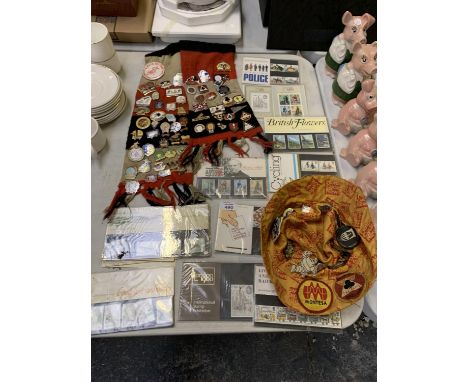 A MIXED COLLECTION OF VINTAGE BADGES TO INCLUDE MICHELIN MAN AND FIRST DAY COVERS 