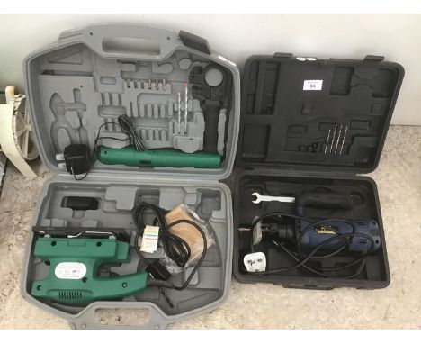 A CASED ELECTRIC SANDER AND A CASED ROUTER BOTH IN WORKING ORDER 