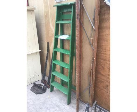A VINTAGE SIX STEP GREEN PAINTED WOODEN STEP LADDER AND A VINTAGE FOLDING WOODEN TABLE 