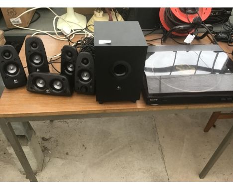 A SONY RECORD DECK AND A LOGITEK SURROUND SOUND SPEAKER SET IN WORKING ORDER 