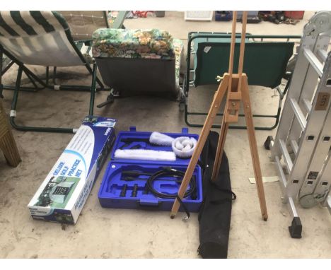 A WOODEN ARTISTS EASEL WITH CASE, A PRESSURE WASHER BRUSH SET IN A CASE AND A DELUXE GOLF PRACTICE NET 