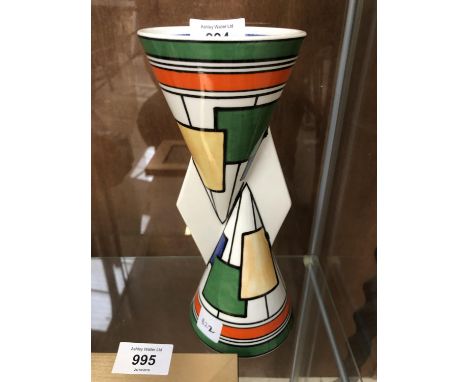 A WEDGWOOD CLARICE CLIFF 'YO-YO' PATTERN VASE 