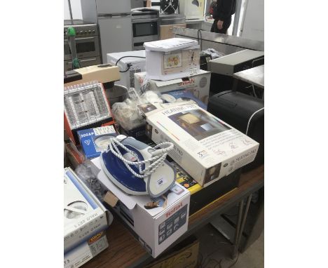 A HEAT LAMP, HEAT PAD, IRON, TEASMADE, SMOKE ALARM ETC IN WORKING ORDER 
