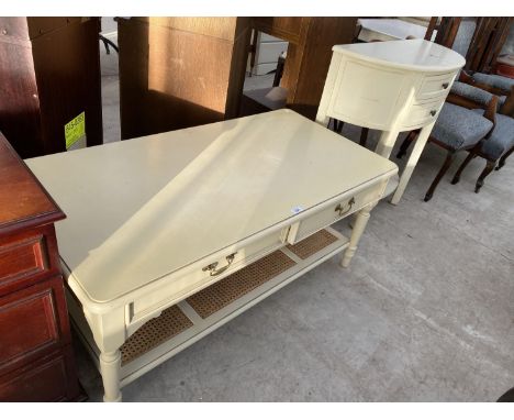 A CREAM COFFEE TABLE WITH TWO DRAWERS AND LOWER RATTAN SHELF AND A CREAM DEMI LUNE CABINET WITH TWO DRAWERS 