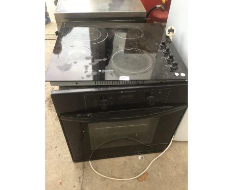 A CERAMIC HOTPOINT HOB TOP TOGETHER WITH OVEN IN WORKING ORDER 