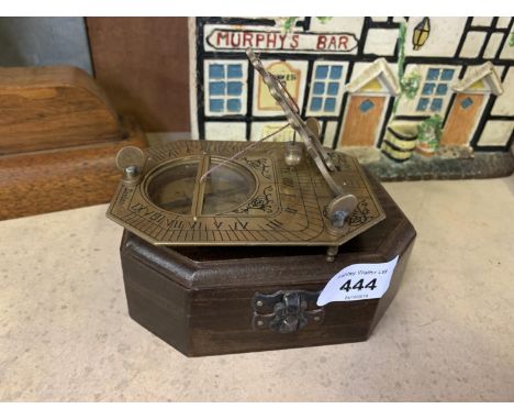 A BOXED BRASS SUNDIAL AND COMPASS COX LONDON 