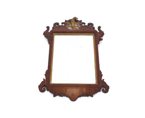 A 19th Century mahogany fret carved wall mirror, in the Chippendale manner, having gilt Ho Ho bird decoration, 70cm x 40cm in