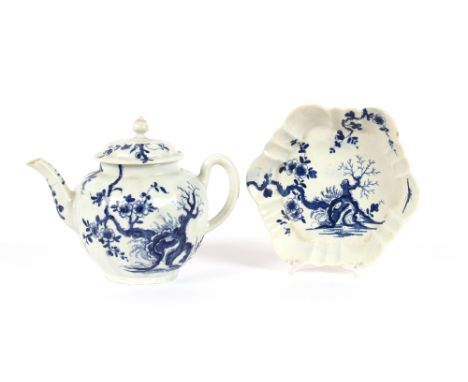 An 18th Century Worcester blue and white teapot and stand,&nbsp;"Prunus Root" decoration, workman's mark to the underside of 