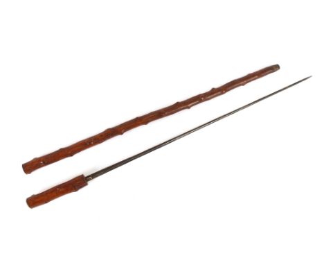 A 19th Century rustic sword stick, with diamond section blade, 69cm