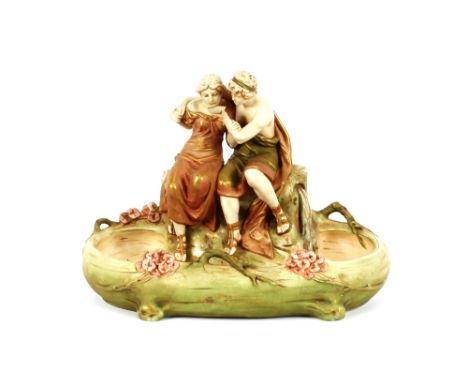 A Royal Dux planter,&nbsp;decorated with seated lovers and floral sprays, 37cm long&nbsp;