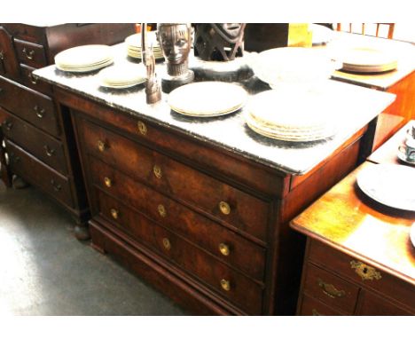 A Continental mahogany commode, surmounted by a grey marble top, blind frieze drawer and three long drawers below, raised on 