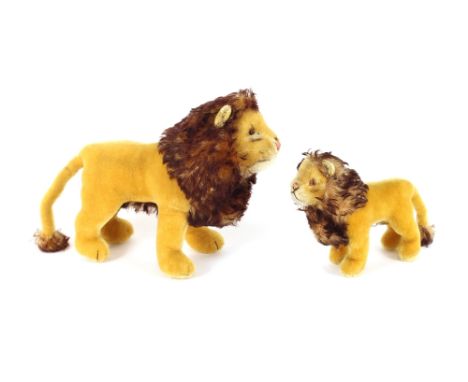 One large and one small Steiff Lion,&nbsp;one with button in ear, (2)