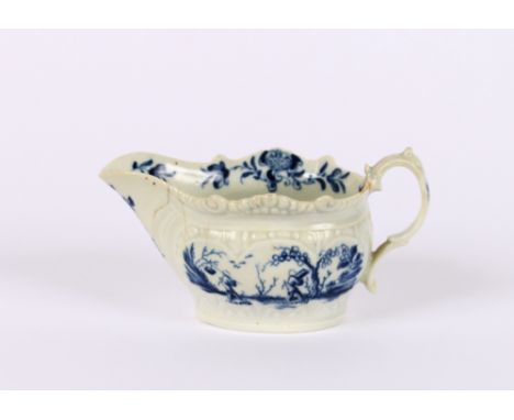 An 18th Century Worcester cream jug, decorated with foliate sprays on a moulded ground, 13cm AF