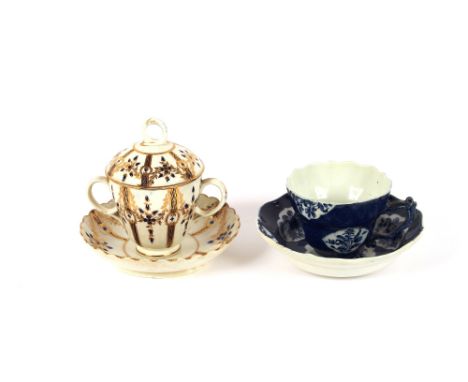 A 19th Century porcelain chocolate cup, saucer and cover, having gilt heightened floral decoration; and an English porcelain 