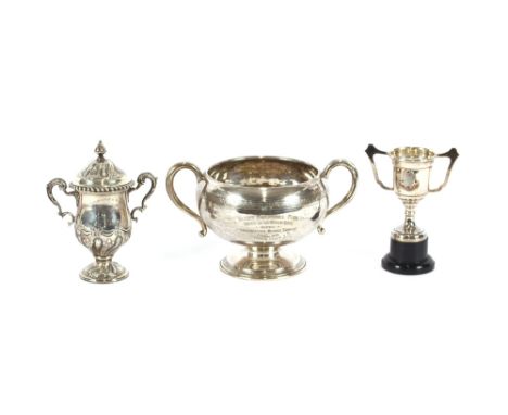 A small silver campana shaped trophy, by Mappin &amp; Webb, Sheffield&nbsp; 1935,&nbsp;&nbsp;having gadrooned domed lid, twin