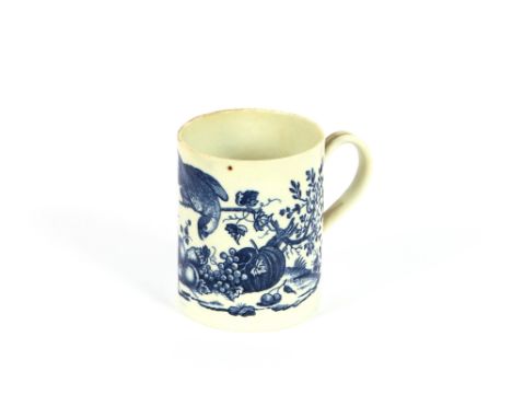 An 18th Century Worcester mug,&nbsp;decorated parrot, fruit and foliage, with reeded handle, 8.5cm high