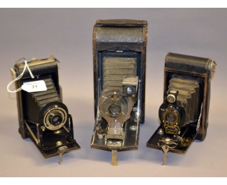 A Kodak Folding Brownie SX-20; Eastman Kodak folding camera and a Kodak no. 2 Autographic Brownie