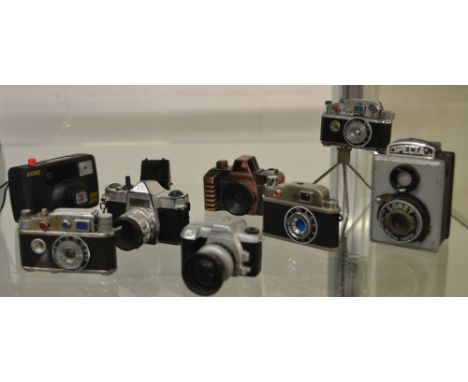 Occupied Japan gas petrol cigarette lighter vintage camera & tripod, along with another similar, a gas lighter in the form of