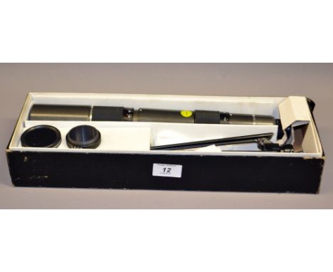 A boxed swallow telescope with tripod.