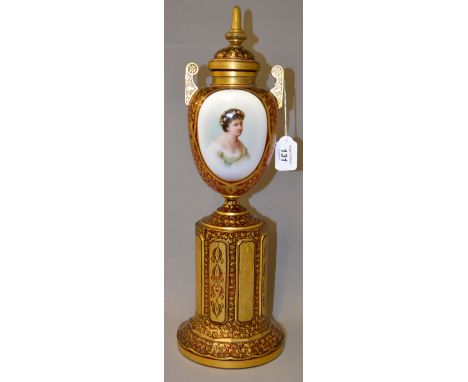 A Bohemian painted and gilt ruby glass covered urn CONDITION REPORT; Good order overall, light gilt-loss throughout but mostl