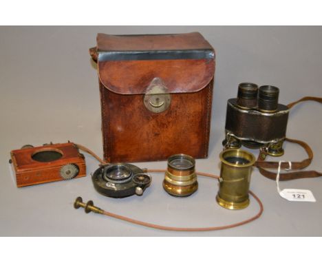 Vintage brass and leather covered Binoculars and early brass lenses and other items in a leather case.