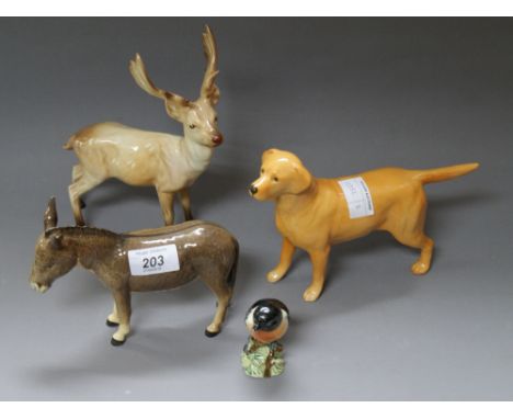 Beswick, a ceramic stag, Labrador, donkey and a Stonechat