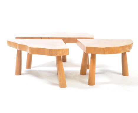 Contemporary ' live edge ' coffee tables with polished sectional trunk top over splayed leg base. 34x60x41cm
