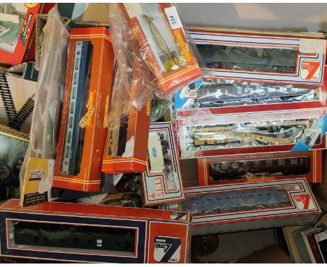 A collection of Hornby and Lima boxed carriages, trucks etc&nbsp; 