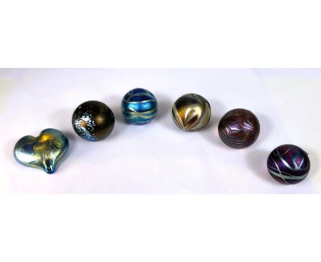 Paperweights: Six small paperweights all with coloured lustre surfaces with various decoration, ones heart shaped all impress