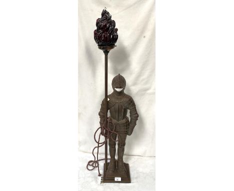 A "Knight in Armour" floor standing cast metal lamp 