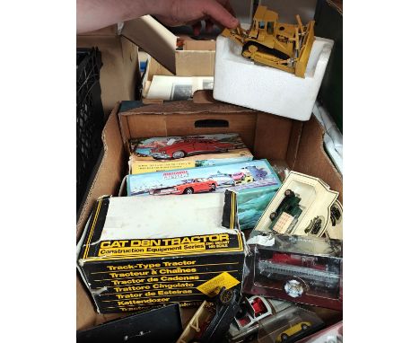 A collection of boxed and loose die-cast vehicles, various models etc. including CAT D8N Tractor, Minister Deluxe car etc 