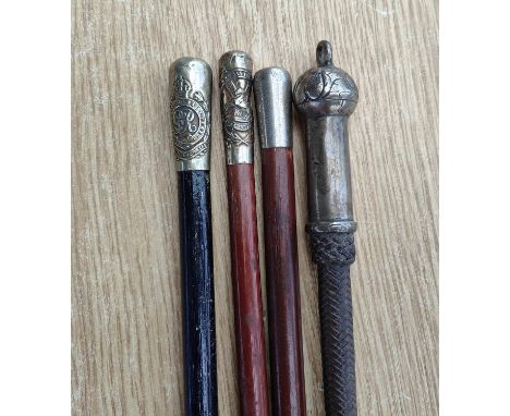 An early 20th century Royal Engineers swagger stick, Liverpool Scottish King's swagger stick and another and an officer's rid
