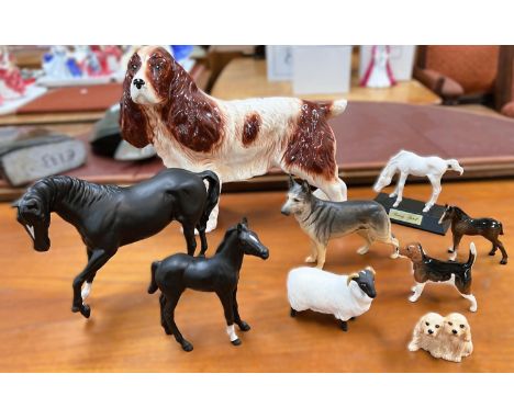 A Beswick bisque black horse; a Royal Doulton bisque black foal; a bisque Beswick sheep; a bisque Beswick Alsatian CH UIRICA 