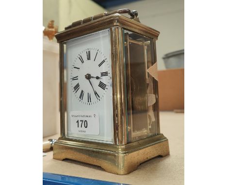 A 19th century large brass carriage clock with timepiece movement, height 14cm 