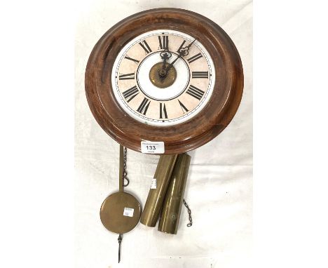 A circular 19th century "Postman's Alarm" wall clock with white and pink dial and double weight driven movement striking on b
