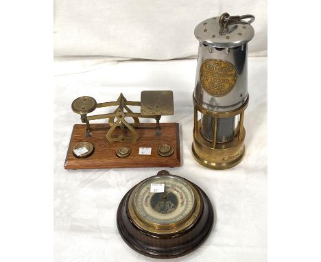 A Protector "Type 1A" miner's lamp; a set of 19th century postal scales; a small barometer 