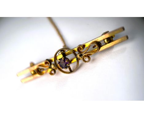Amethyst set bar brooch with filigree decoration (unmarked) 