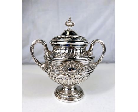 A Rococo style 2 handles covered vase by WMF, having extensive relief decoration, on pedestal base, height 22cm 