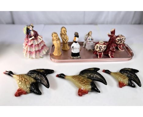 A Royal Doulton figure "The Hinged Parasol" HN1578; a Royal Worcester 'choir' figure and other animals and figures 
