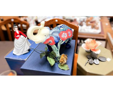 A large boxed Royal Tupton ware elephant, A Royal Worcester figure Equestrian, A Royal Doulton figure 'Pretty Ladies Summer' 